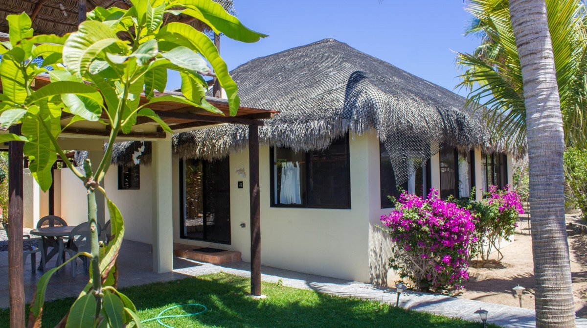 Low palapa-roofed casita at Cabo Pulmo Beach Resort, an example of the small off-grid buildings the village is made of